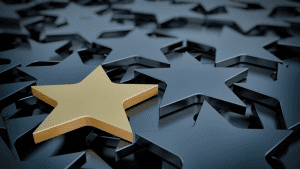 collection of stars with one gold star standing out