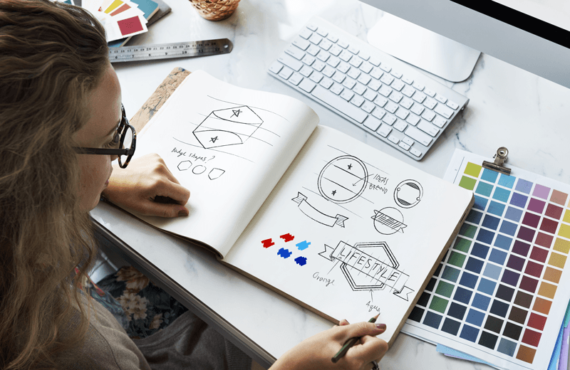 woman designing a logo