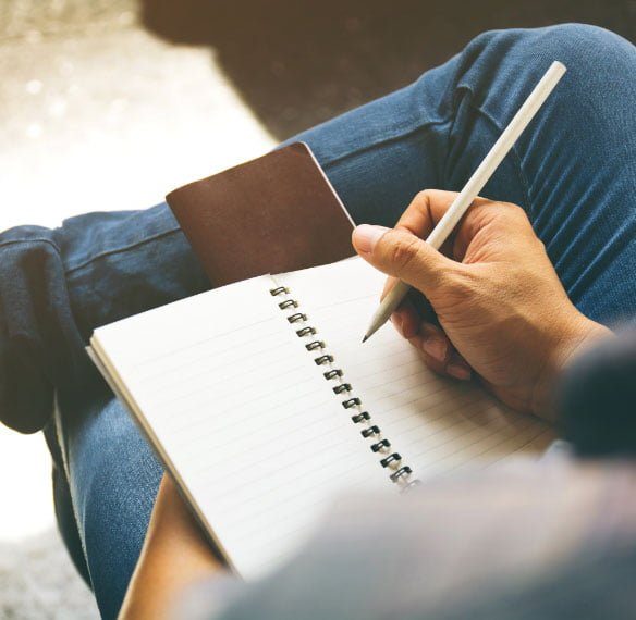 shutterstock_734826058@2x writing