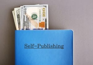 blue book with money inserted